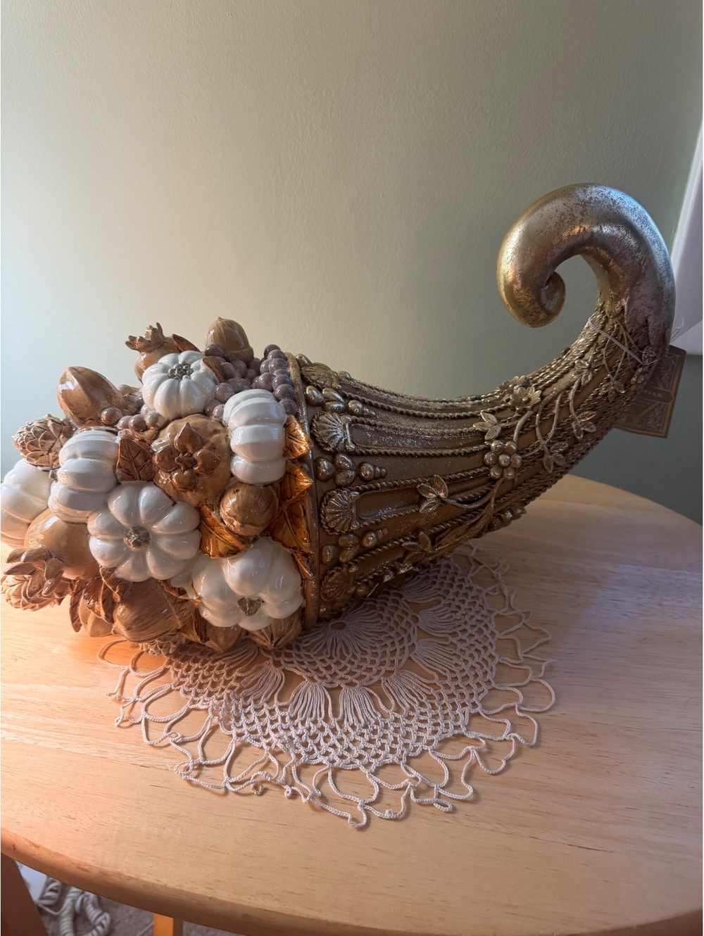 Decorative Cornucopia Centerpiece with White and Gold Pumpkins and Fruits